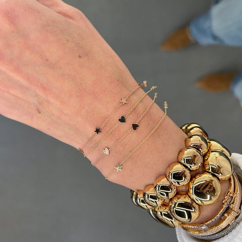 Three Itty Bitty Hearts Bracelet with One Pave